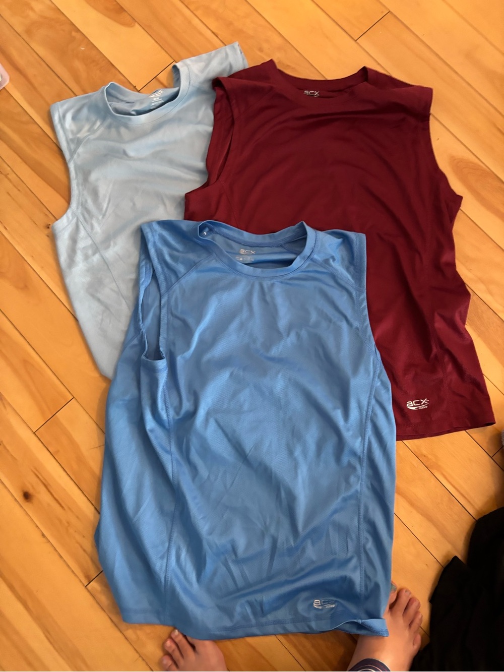 3 Athletic Sleeveless Tops - Light Blue, Sky Blue, Burgundy